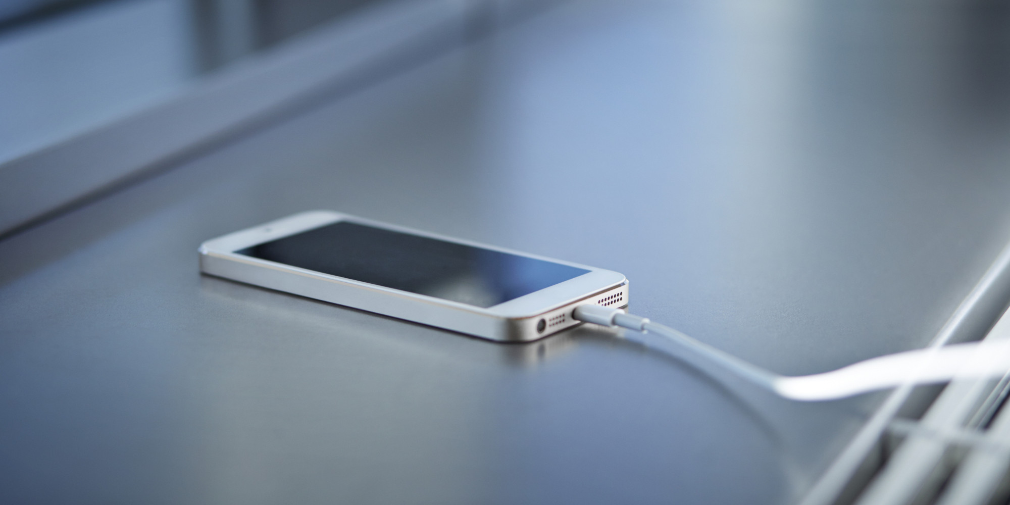 Close-up of smartphone charging