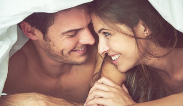 Shot of a loving young couple under their duvet in the bedroomhttp://195.154.178.81/DATA/i_collage/pi/shoots/783281.jpg