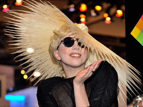 LAS VEGAS - JANUARY 07:  Singer Lady Gaga during an announcement of Lady Gaga's long term partnership with Polaroid as the brand's creative director on a speciality line of imaging products at the 2010 International Consumer Electronics Show at the Las Vegas Convention Center January 7, 2010 in Las Vegas, Nevada. CES, the world's largest annual consumer technology tradeshow, runs through January 10 and is expected to feature 2,500 exhibitors showing off their latest products and services to about 110,000 attendees.  (Photo by David Becker/Getty Images)   Original Filename: GYI0059240757.jpg