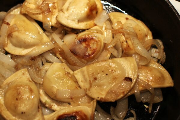 pierogies-and-onions-in-a-cast-iron-skillet