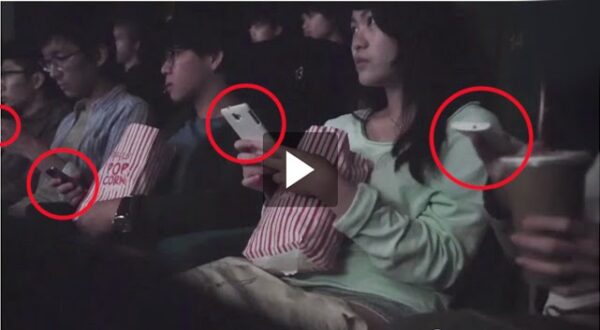 These People Whip Out Their Phones In A Movie Theater