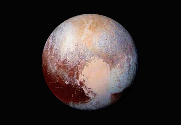 This NASA's photo of Pluto was made from four images from New Horizons' Long Range Reconnaissance Imager (LORRI) combined with color data from the Ralph instrument in this enhanced color global view released on July 24, 2015. The images, taken when the spacecraft was 280,000 miles (450,000 kilometers) away, show features as small as 1.4 miles (2.2 kilometers). REUTERS/NASA/JHUAPL/SwRI/Handout TPX IMAGES OF THE DAY FOR EDITORIAL USE ONLY. NOT FOR SALE FOR MARKETING OR ADVERTISING CAMPAIGNS. THIS IMAGE HAS BEEN SUPPLIED BY A THIRD PARTY. IT IS DISTRIBUTED, EXACTLY AS RECEIVED BY REUTERS, AS A SERVICE TO CLIENTS