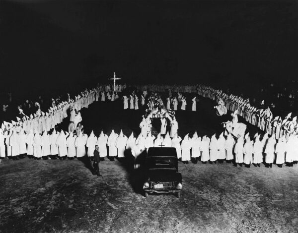 This picture shows a nighttime Ku Klux Klan ceremony in Williamson, West Virginia in 1924. (AP Photo/Sayre)