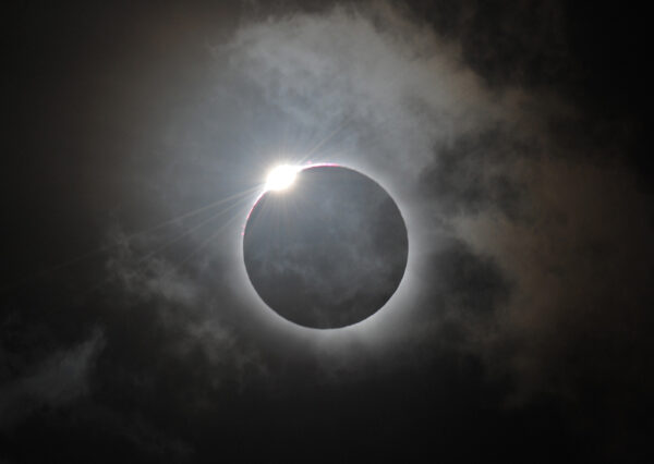 The Diamond Ring effect is shown following totality of the solar eclipse at Palm Cove in Australia's Tropical North Queensland on November 14, 2012. Eclipse-hunters have flocked to Queensland's tropical northeast to watch the region's first total solar eclipse in 1,300 years on November 14, which occurred as the moon passed between the earth and the sun, casting a shadow path on the globe and lasting for a maximum on the Australian mainland of 2 minutes and 5 seconds. AFP PHOTO / Greg WOOD (Photo credit should read GREG WOOD/AFP/Getty Images)