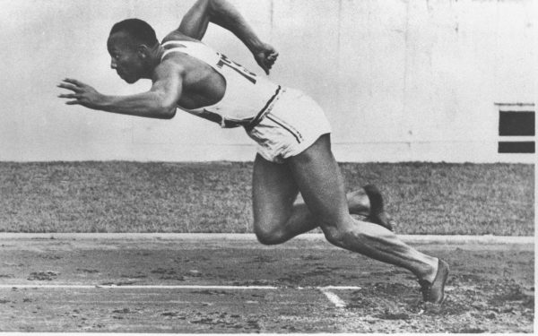 1-16 Aug 1936: Jesse Owens of the USA starts the 200 metres event at the 1936 Olympic Games in Berlin. Owens won the gold medal in this event with a time of 20.7 seconds. Mandatory Credit: IOC Olympic Museum /Allsport
