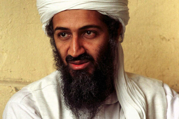 FILE - In this April 1998 file photo, exiled al Qaida leader Osama bin Laden is seen in Afghanistan. Osama bin Laden was unquestionably within reach of U.S. troops in the mountains of Tora Bora when American military leaders made the crucial and costly decision not to pursue the terrorist leader with massive force, a Senate report says. (AP Photo, file)
