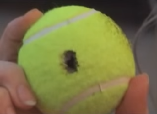 1-ball-with-hole-burned-into-it