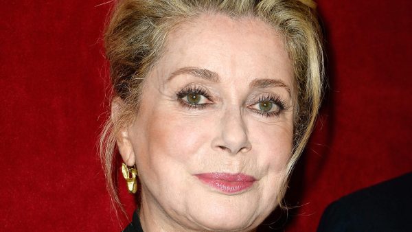 PARIS, FRANCE - SEPTEMBER 28: Catherine Deneuve attends the Jean Paul Gaultier show as part of the Paris Fashion Week Womenswear Spring/Summer 2014 at Le Paradis Latin on September 28, 2013 in Paris, France. (Photo by Pascal Le Segretain/Getty Images)