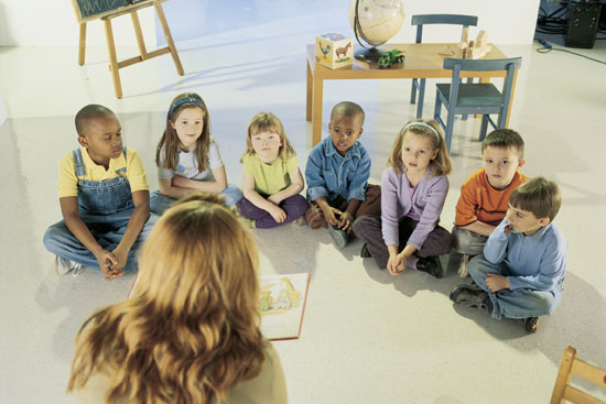 Comstock Images Image 6967 File Size Pixels Action Description: Children listening to teacher at story time Keywords: full-length, high angle view, 5-6 years, children, story time, sitting, teacher, african american, interracial, classroom, adult, caucasian, class, listening, woman, color, blonde, large group of people, boys, students, school, attentive, girls, african descent, education, indoor, brunette, reading, diversity, serious