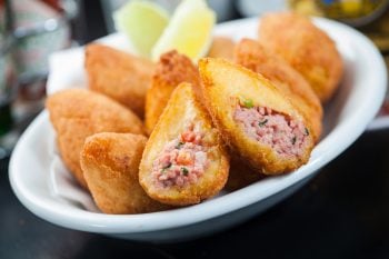 Qual a origem dos apelidos “coxinha” e “mortadela”?