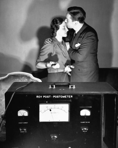 A view of subjects kissing while geared to a lie detector machine to measure the emotional reacton. (Photo by Herbert Gehr/The LIFE Images Collection/Getty Images)