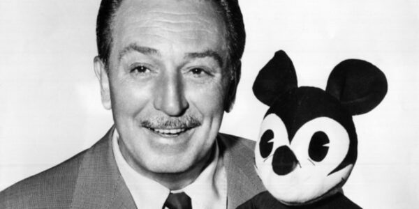 The American cartoonist and director Walt Disney with a plush puppet of Mickey Mouse. 1950s (Photo by Mondadori Portfolio via Getty Images)