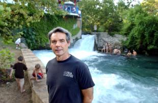 7/4/05 Dave Newman rescued a man on Sunday, July 3rd here in the San Marcos river at Sewell Park in San Marcos. The man flowed by with the current with only the top of his head showing, Newman said. Then he disappeared under the concrete wall on the left side of the frame. Newman went into the water to rescue him and was able to pull him out about 10 minutes later. There were a few air pockets under the concrete wall. EMS workers and University police who were called to the scene, yelled to Newman to get out of the water. He took the safest way out of the water which took him behind the waterfall and then around to shallow water. When he got out, he was arrested for failing to obey the orders to get out of the water. He spent the night in jail. Laura Skelding AMERICAN-STATEMAN