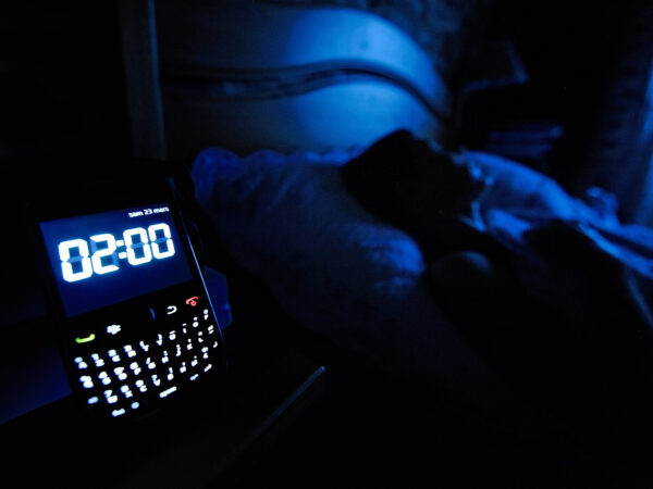 v2-pg-38-sleeping-with-phone-getty