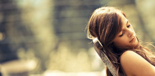 Teen girl resting outdoors