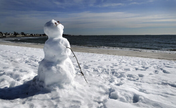 EAST LYME 2/9/11- The winter of 2011 has been so severe that there is even snow on the beach at Rocky Neck State Park. A walk along the cold, windy beach on Wednesday revealed a snowman looking out at Long Island Sound dreaming of the day when the beach will be covered with swimmers in bathing suits lying on blankets in the hot sun. The way the season is going, the snowman may still be there in June. STEPHEN DUNN|sdunn@courant.com ORG XMIT: B581051101Z.1