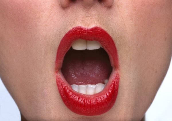 close-up of a woman with her mouth open