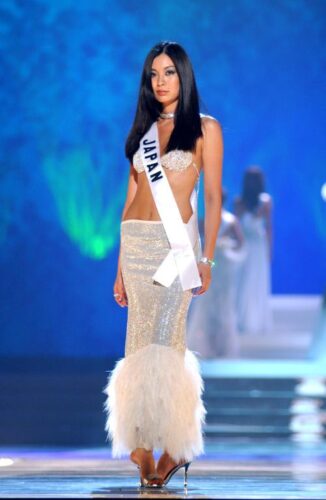 Miyako Miyazaki, Miss Japan 2003, from Kumamoto, competes May 29, 2003 in her choice of evening gown during the 2003 Miss Universe Presentation Show at the Panama Canal Village Convention Center in Panama City, Panama. During the Presentation Show, each Miss Universe delegate is judged by a preliminary panel of distinguished judges in three categories. These categories consist of individual interview, swimsuit competition and evening gown competition. The scores are tallied and the Top 15 delegates will be announced during the LIVE broadcast of the 52nd annual Miss Universe competition on Tuesday, June 3, 2003 from Panama City, Panama on NBC at 9:00 PM (ET)/8 PM (CT) (delayed PT). ho/MISS UNIVERSE L.P., LLLP