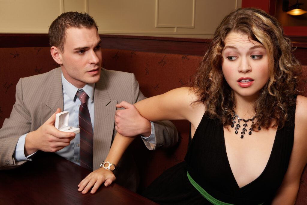 Woman breaking up with man at restaurant