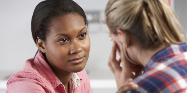 Teenage Girl Visits Doctor's Office Suffering With Depression