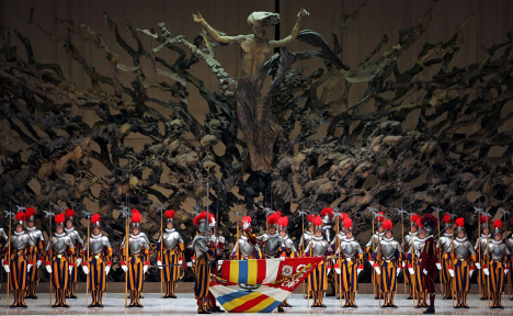 One of 38 new Swiss Guard recruits is sworn in during a ceremony in Paul VI hall at the Vatican May 6. New recruits are sworn in every year on May 6, commemorating the date on which 147 Swiss soldiers died defending the pope during an attack on Rome in 1527. (CNS photo/Max Rossi, Reuters) (May 7, 2007) See POPE-GUARDS May 7, 2007.