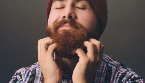 man-with-beard-itching-his-face