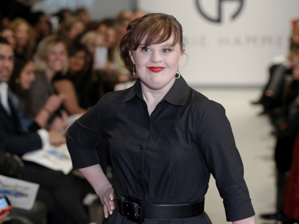 NEW YORK, NY - FEBRUARY 12:  Actress Jamie Brewer walks the runway during the Role Models Not Runway Models - Carrie Hammer Runway - Mercedes-Benz Fashion Week Fall 2015 at Lightbox on February 12, 2015 in New York City.  (Photo by Brian Ach/Getty Images)