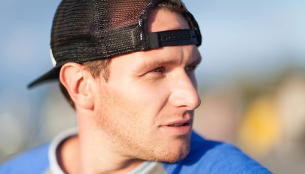 Man in a trucker cap. Outdoor shoot