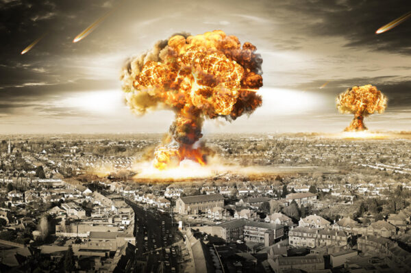 EHC0JJ Danger of nuclear war illustration with multiple explosions