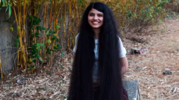 Conheça a adolescente com o cabelo mais comprido do mundo